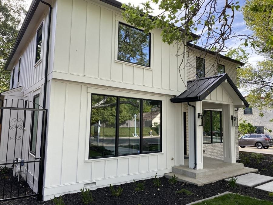 Sacramento home with new board-and-batten siding and black window trim